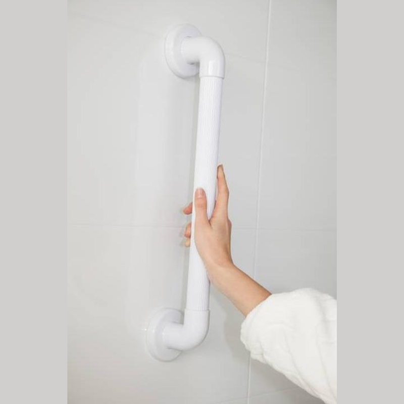Atlantis moulded fluted grab rail installed in a bathroom wall for added support and stability