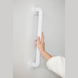Atlantis moulded fluted grab rail installed in a bathroom wall for added support and stability